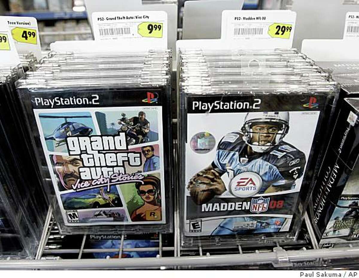 Obtaining Take-Two would help EA keep pace with Activision Blizzard, the merger between Ac?tivision and Vivendi Games. It also would add huge moneymakers like Grand Theft Auto.Electronic Arts video game Madden 08 is on display next to Take-Two Interactive Software video game Grand Theft Auto at Best Buy in Mountain View, Calif., Monday, Feb. 25, 2008. Video game maker Electronic Arts Inc. on Monday urged the publisher of "Grand Theft Auto" to quickly accept its unsolicited $2 billion takeover bid, saying it's only a matter of time before it declares "game over" and pulls its premium offer. EA wants an agreement on a deal before the release of "Grand Theft Auto IV." Take-Two Interactive Software Inc. says it's willing to talk, but only after the next installment of its popular crime game goes on sale in April. (AP Photo/Paul Sakuma)