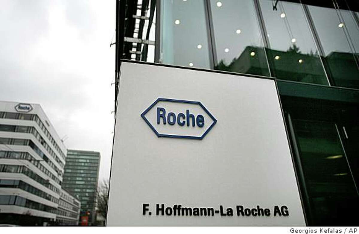 ** FILE ** In this March 16, 2006 file photo, the Roche buildings in Basle, Switzerland, are seen. Swiss pharmaceuticals company Roche Holding AG made a fresh bid to buy U.S.-based Genentech Inc. Friday, Jan. 30, 2009 by offering US$86.50 per share, US$2.50 less than its previous offer, directly to shareholders. (AP Photo/Keystone, fls/Georgios Kefalas, file)