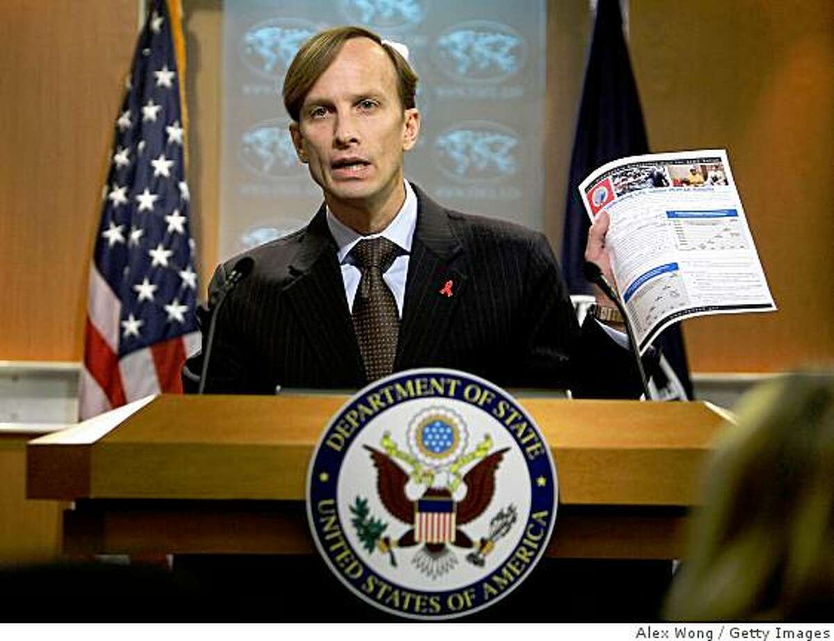 WASHINGTON - JANUARY 12: U.S. Global AIDS Coordinator Mark Dybul holds up a fact sheet on AIDS during a news conference at the Department of State January 12, 2009 in Washington, DC. Dybul briefed the media at the news conference of the release of "The President's Emergency Plan for AIDS Relief 2009." (Photo by Alex Wong/Getty Images)