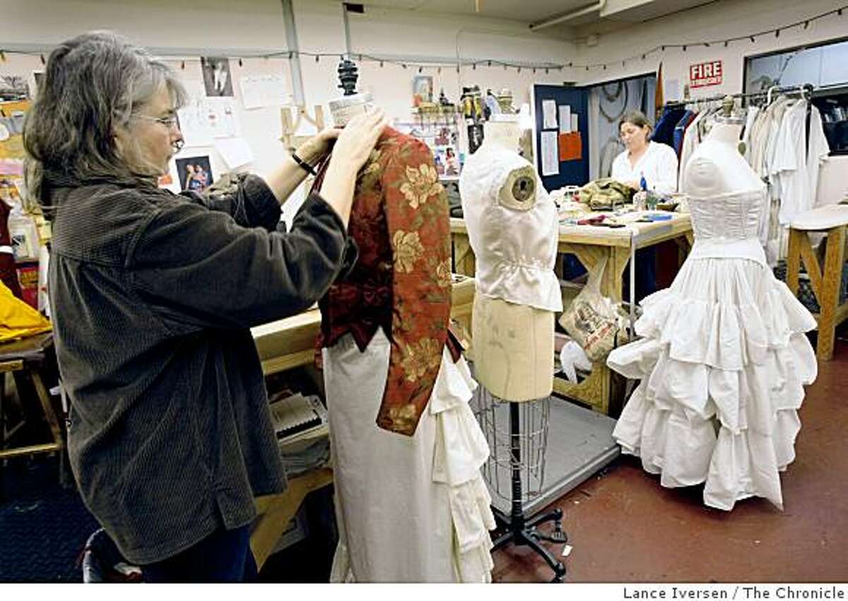 Kitty Muntzel a drapper in the costume department of Berkeley Repertory Theater works on a dress for the upcoming play 'In the Next room or the vibrator play. Friday Jan 23, 2009