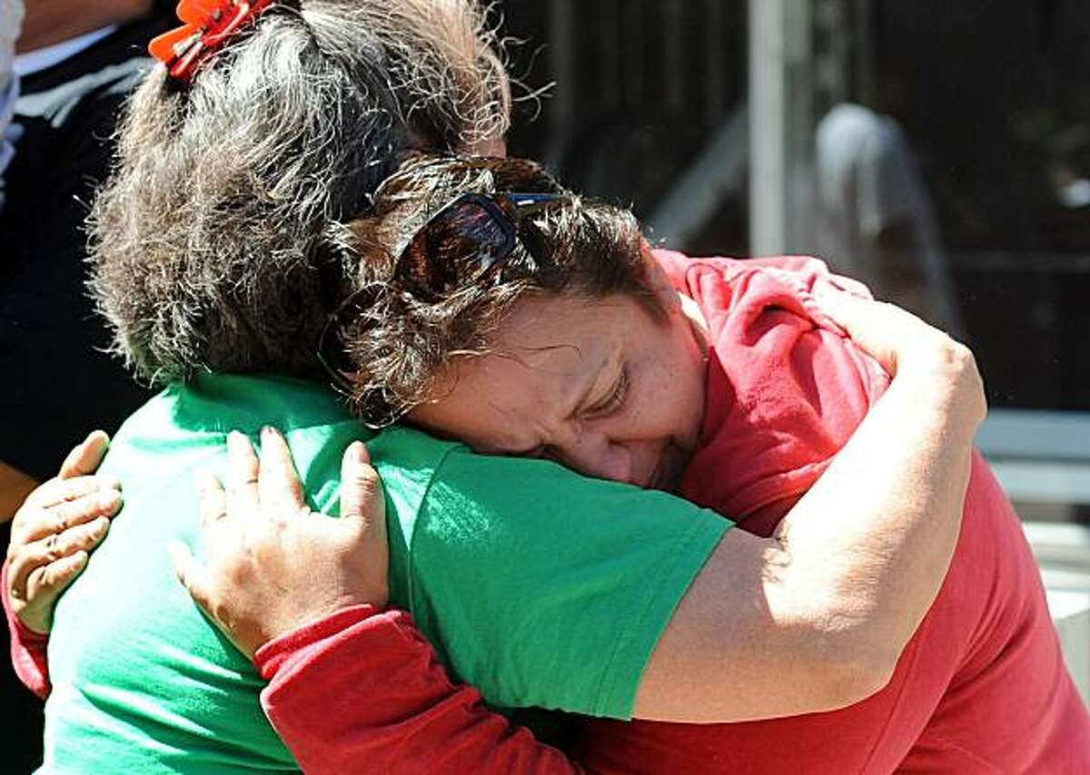 Antonia Locon (right) is seen outside the Veterans Memorial Recreation Center in San Bruno on Friday September 7, 2010. Her family had to evacuate their home after a massive natural gas pipeline explosion Thursday night.
