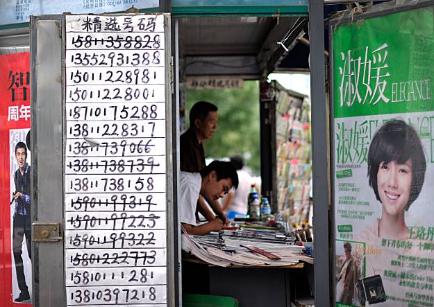 China requires ID to buy cell phone numbers