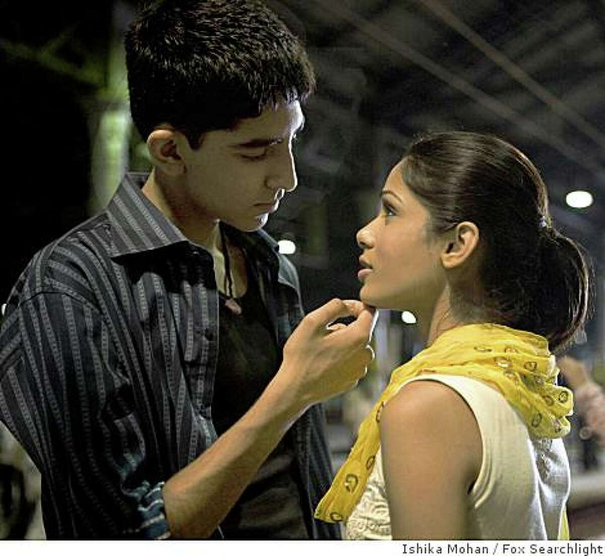 In this image released by Fox Searchlight pictures, Dev Patel, left, and Freida Pinto are shown in a scene from "Slumdog Millionaire."