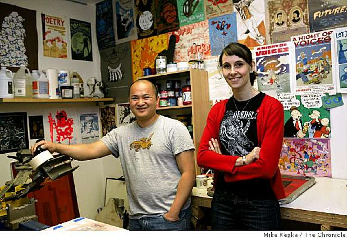Briana Miller (r) and Thien Pham, artists and teachers at Bishop O'Dowd High School in Oakland who recently created a 6-panel comic book set in San Francisco, stand for a portrait in their studio on Monday January 19, 2009 in Berkeley, Calif.