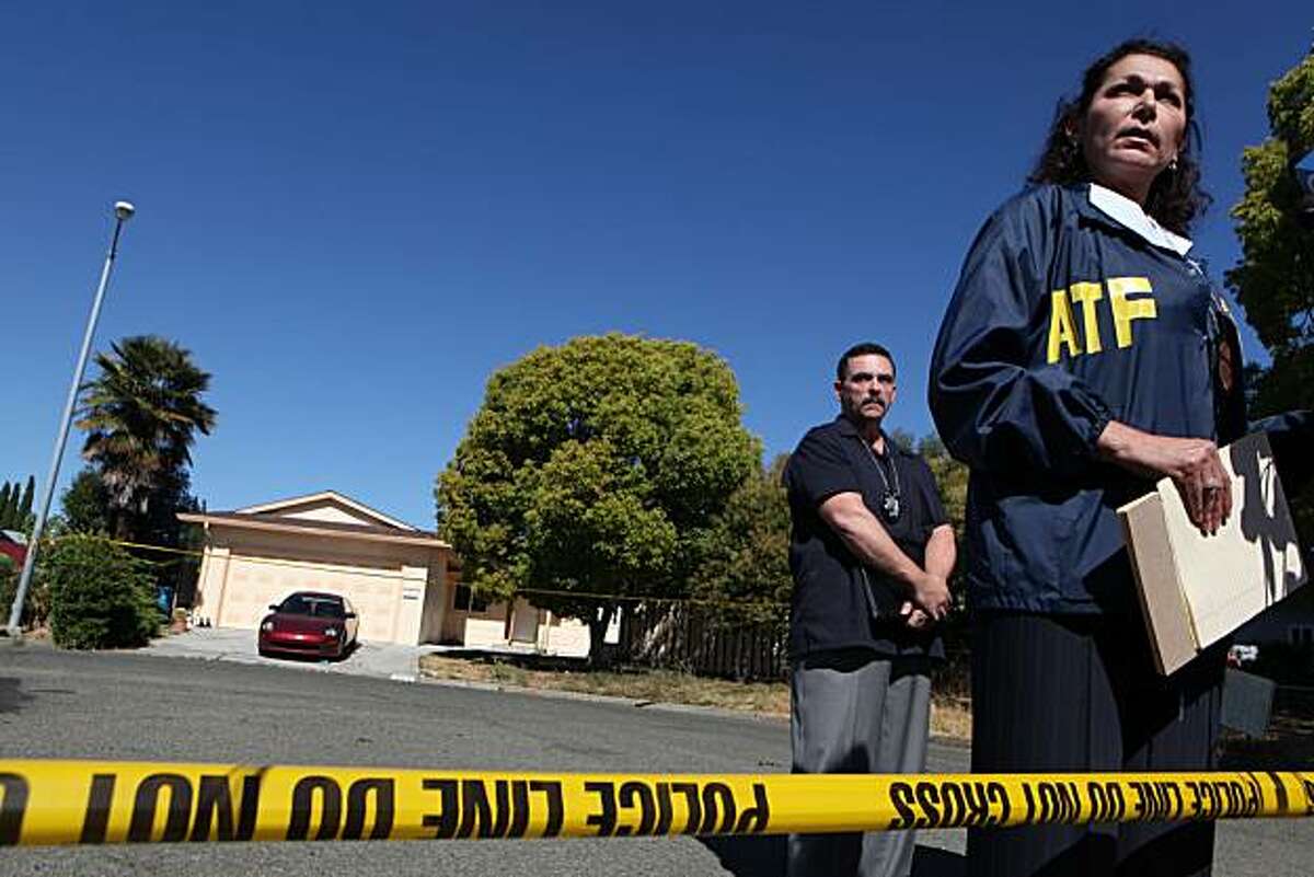 ATF (Bureau of Alcohol, Tobacco, Firearms and Explosives) special agent, Helen Dunkel, a public information officer, right, along with Vallejo police sergeant S. De Jesus speaks during a press conference in front of a home filled with explosive chemicals where the decomposed bodies of two women, Segundina Allen, 63, and Marcaria Smart, 60, were found at Upland Court in Vallejo, Calif. on Wednesday, September 1, 2010. The husband of Allen, Charles Rittenhouse,72, has been arrested in connection with the explosive materials. California Highway Patrol officers shot and killed murder suspect, Efren Baldemora, 38, after a high-speed chase. Kat Wade / Special to the Chronicle