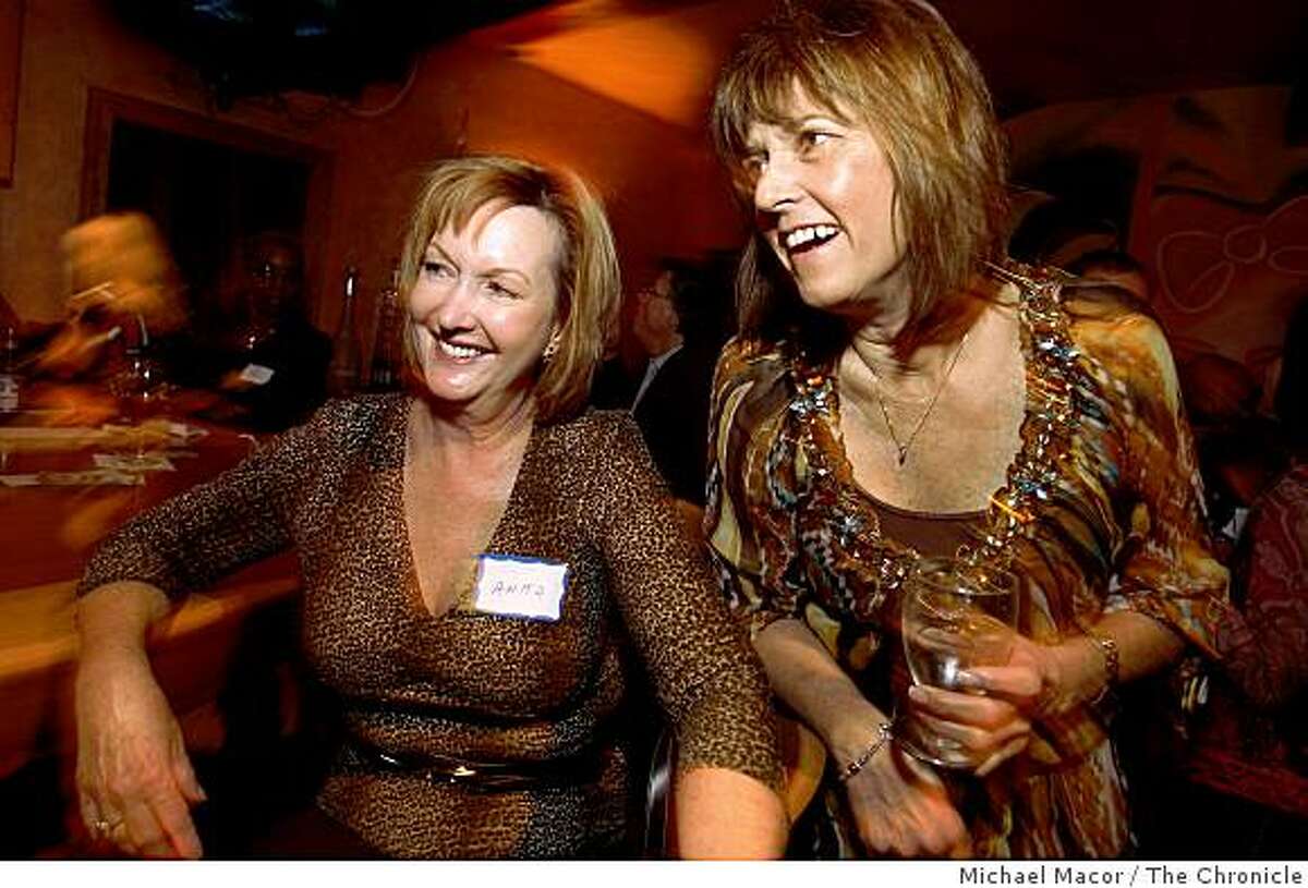 Blake, (left) of Pleasanton and Sue Sunder, of San Ramon share a laugh duri...
