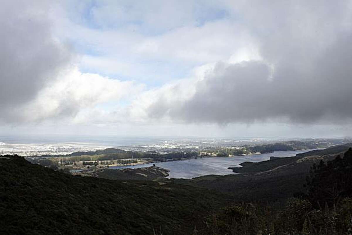 San Andreas Lake sits below Sweeny Ridge as the clouds role in off of the ocean, August 28, 2010, in San Bruno, Calif. It is a climb up to Sweeny Ridge along Sneath Lane in San Bruno, but well worth the trip to see the beautiful vistas, wildflowers and historic Nike missile site.