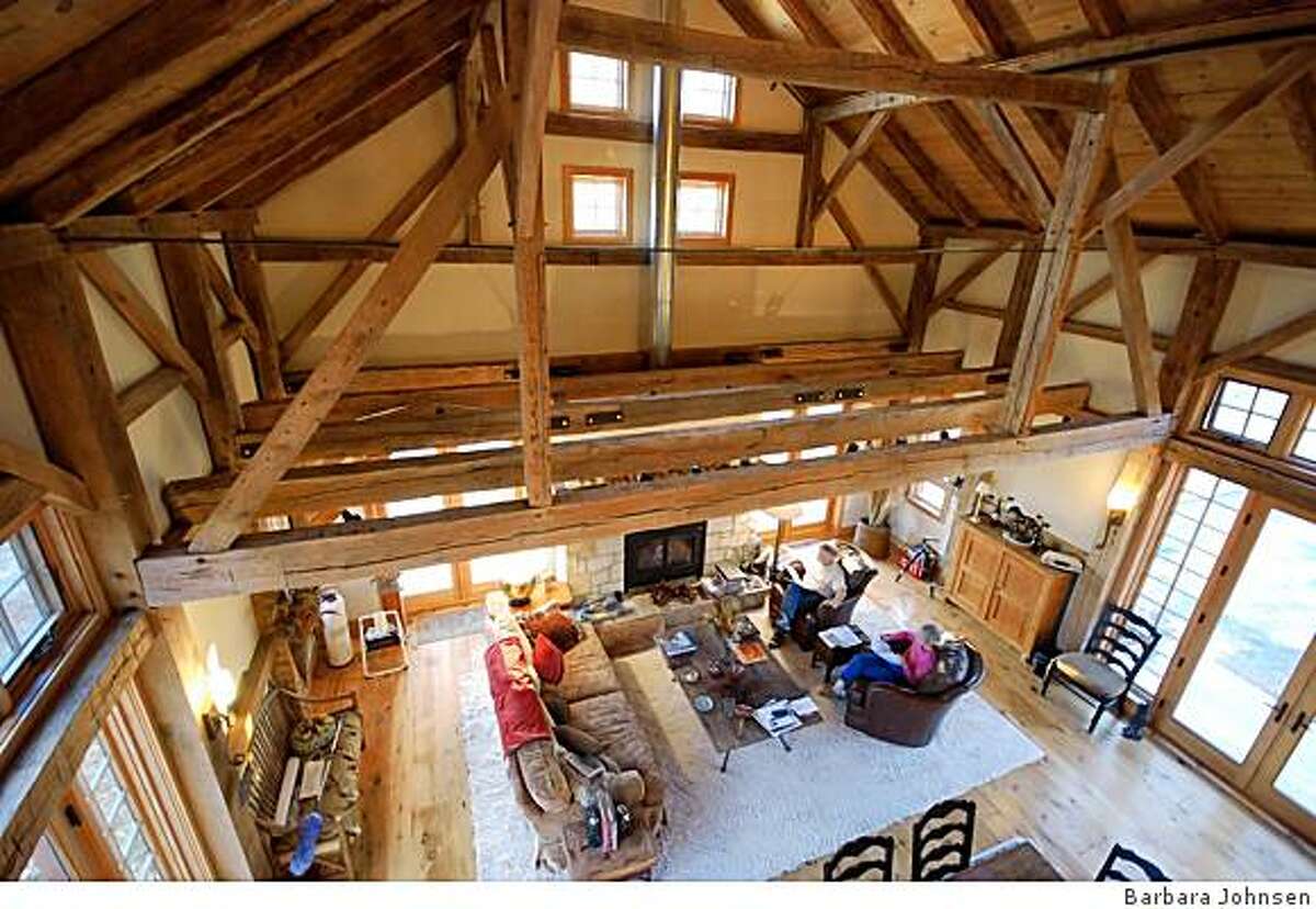 Designer Barbara Johnsen paid $100,000 to have a circa-1840 barn disassembled and hauled from New Jersey to land in Sonoma that was once a junkard. Craftsmen reassembeled the building on a new foundation. The silo was custom made to house a spiral staircase. No nails were used.