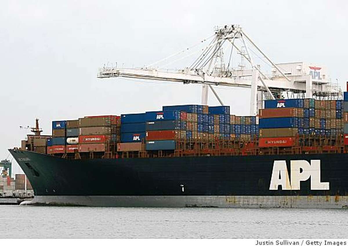 OAKLAND, CA - OCTOBER 30: (FILE PHOTO) An APL container ship is docked at the Port of Oakland October 30, 2008 in Oakland, California. APL shipping, a subsidiary of Neptune Orient Lines, announced November 19, 2008 that it was shedding 1,000 jobs and re-locating its Americas regional headquarters away from Oakland, California. (Photo by Justin Sullivan/Getty Images)