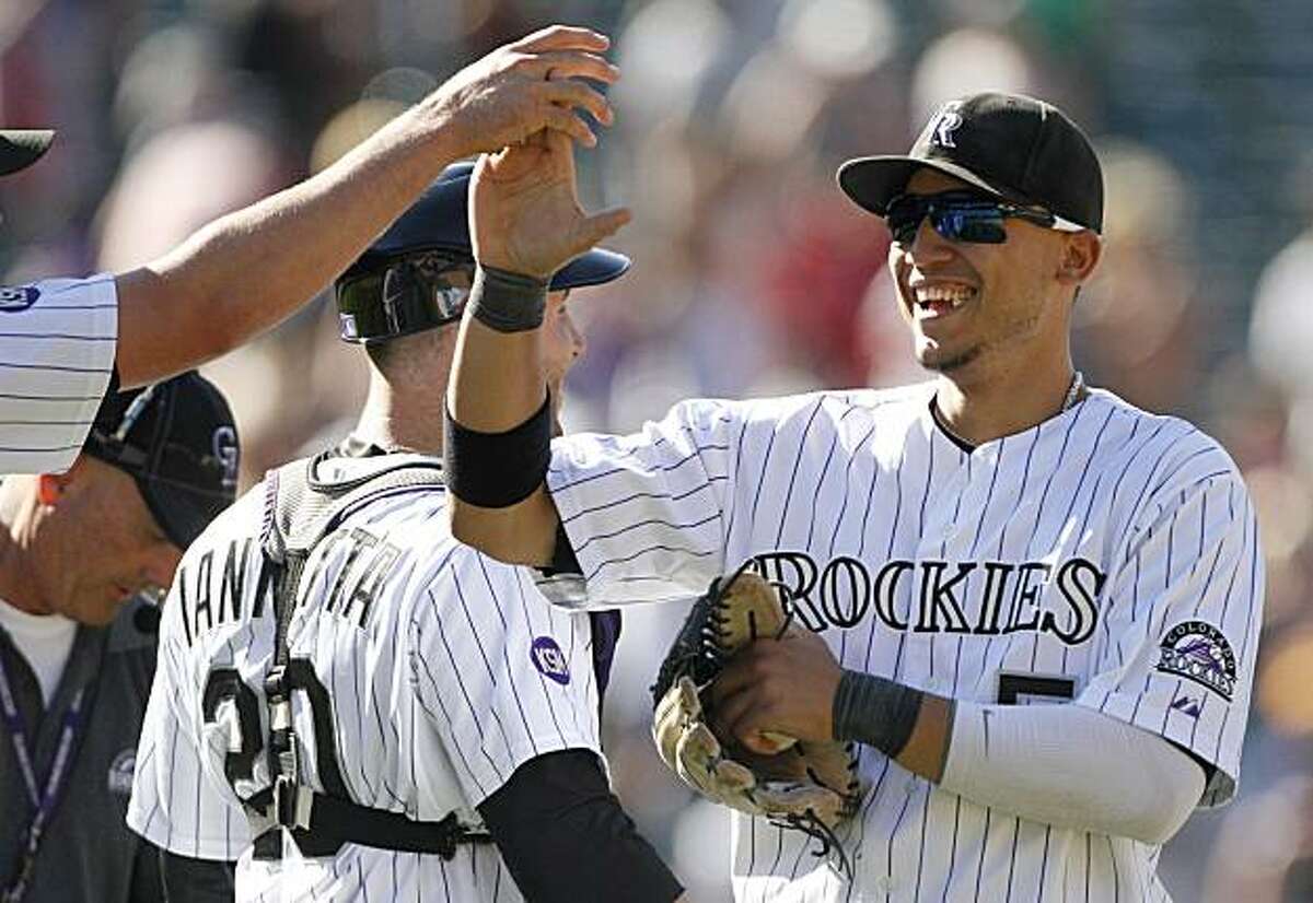 Carlos Gonzalez, Troy Tulowitzki lead Rockies past Reds