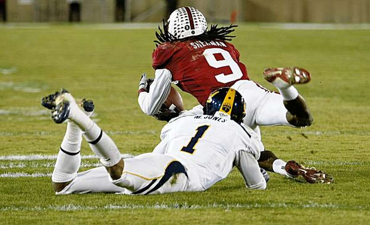 Stanford's Richard Sherman steps in front of Cal's Marvin Jones for a second quarter interception in the Big Game on Saturday.