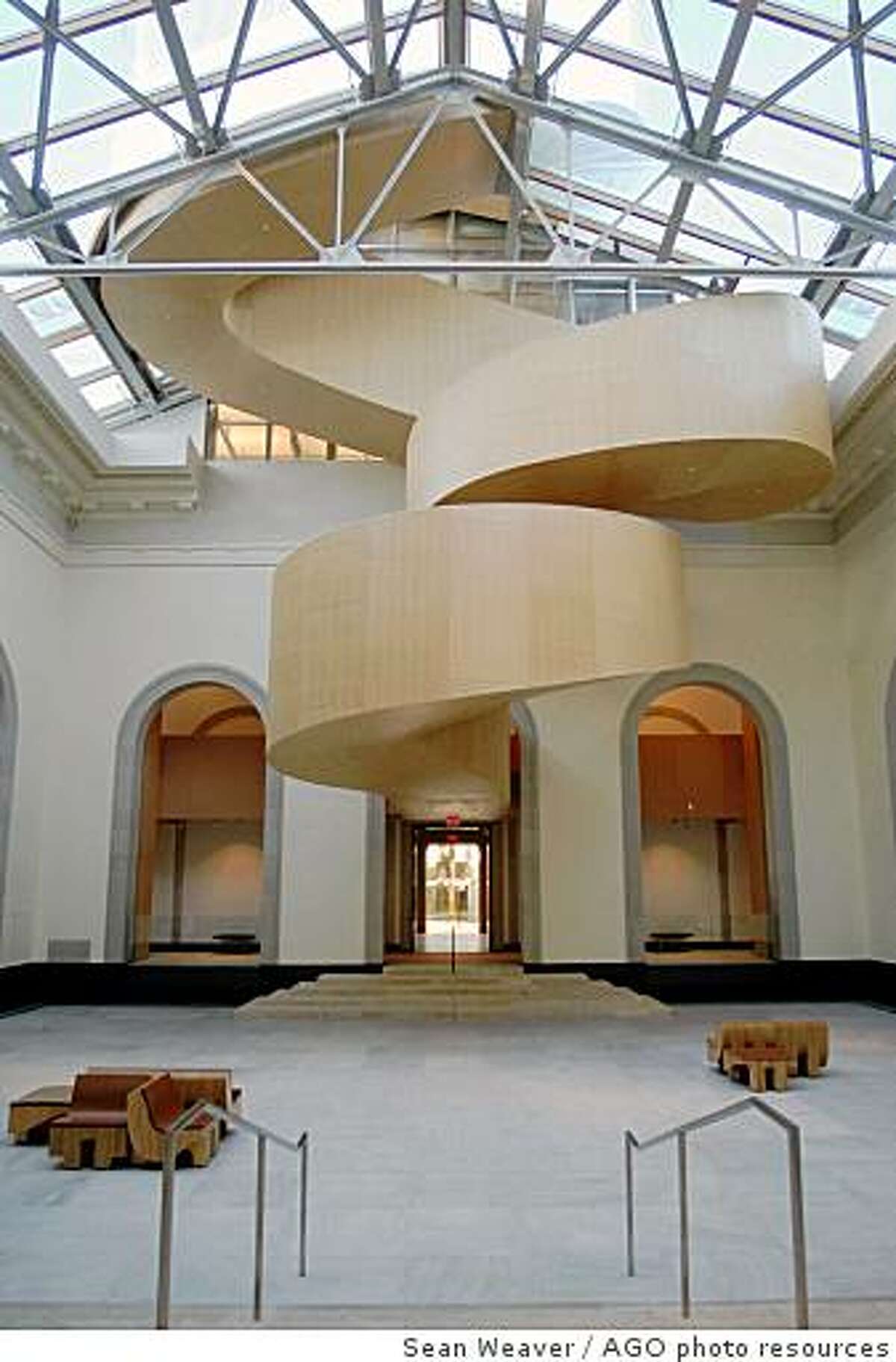 The spiral staircase connecting the existing grand courtyard with his contemporary art extension at the south side of the building. of the museum.