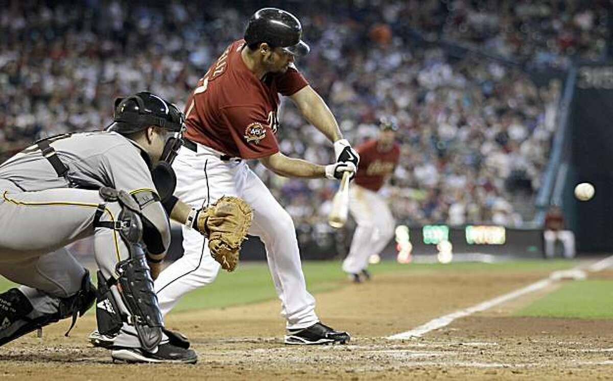 Cardinals' Lance Berkman back on DL with knee injury