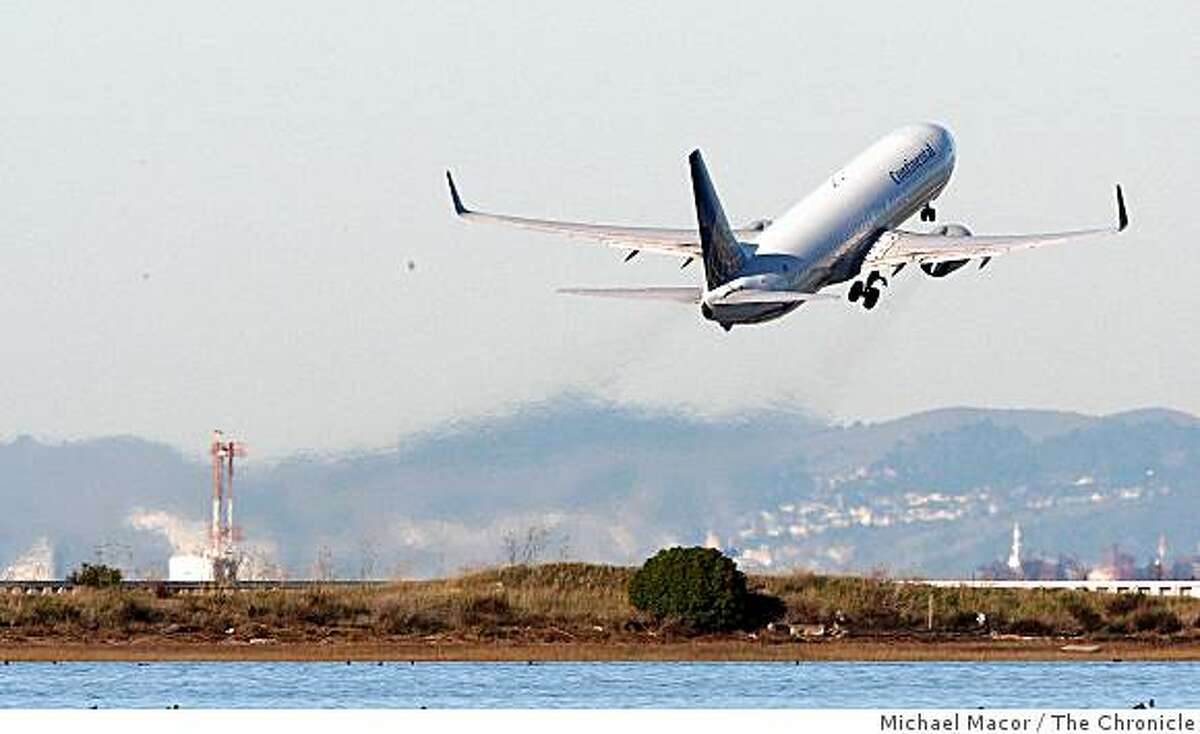 Planes taking off and landing at San Francisco International Airport on Wednesday Dec. 17, 2008