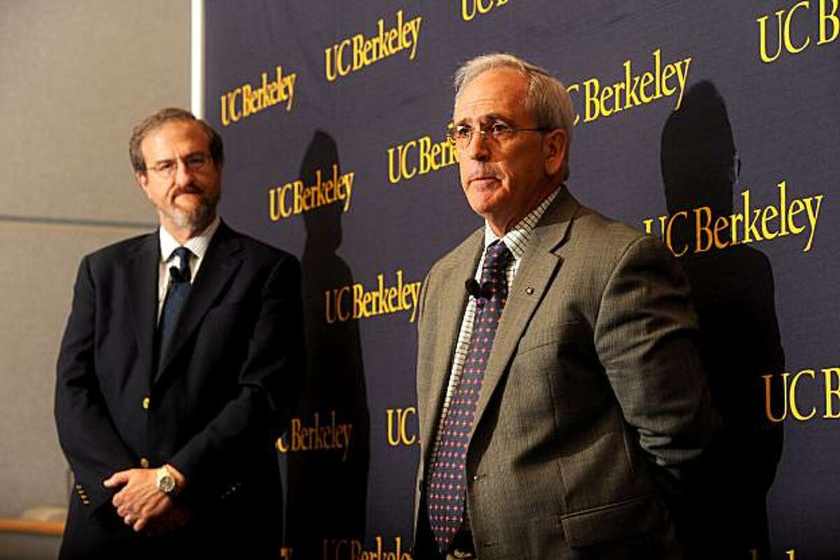 Professor Jasper Rine, a genetics professor at UC Berkeley, discusses the alteration of a genetic testing program on Thursday, Aug. 12, 2010, in Berkeley, Calif. Listening at left is Mark Schlissel, the campus' dean of biological sciences.
