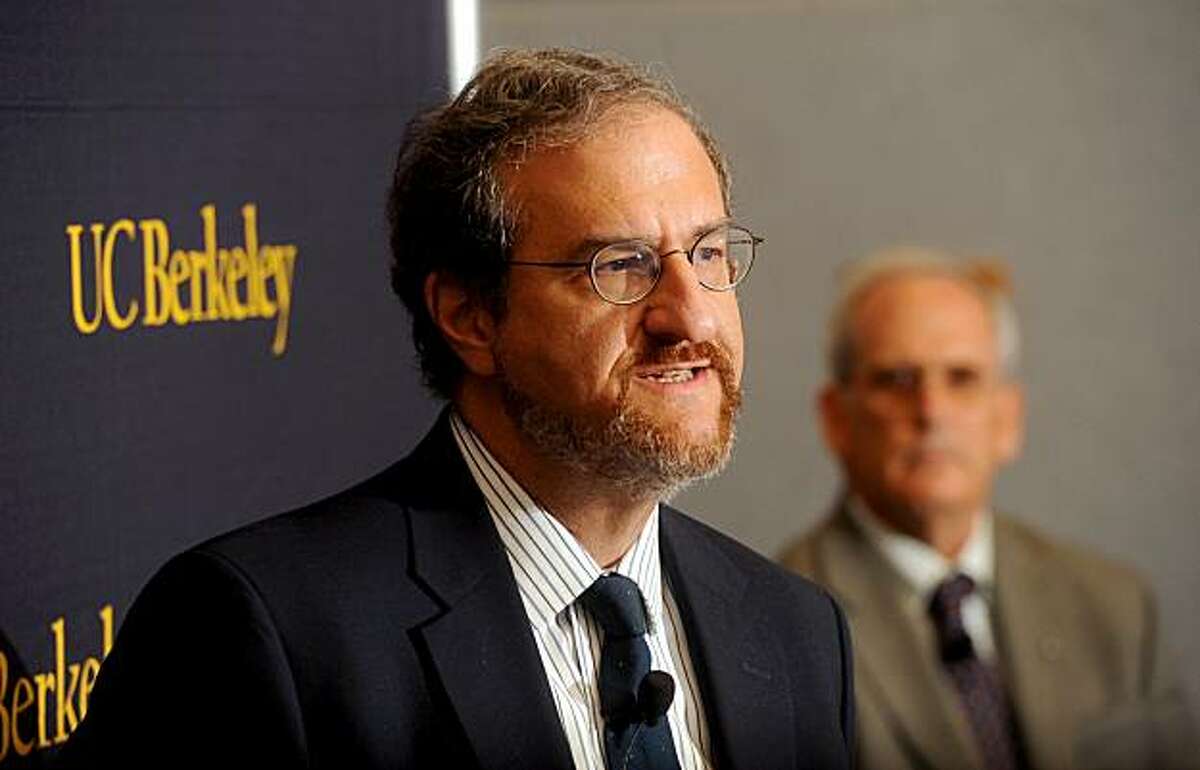 Mark Schlissel, UC Berkeley dean of biological sciences, discusses the alteration of a genetic testing program on Thursday, Aug. 12, 2010, in Berkeley, Calif. At right is Professor Jasper Rine.