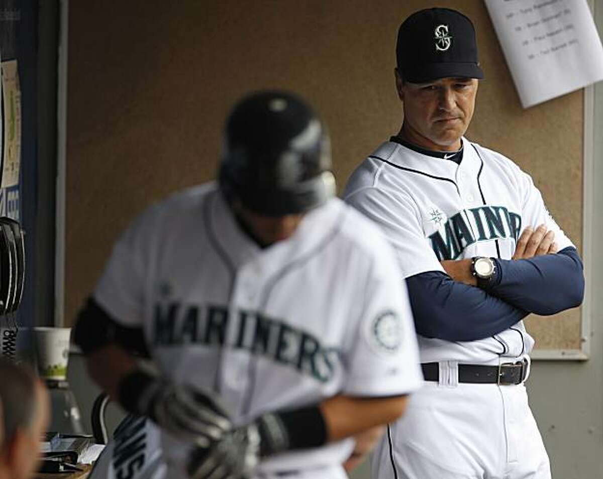 In this Aug. 8, 2010, photo, Seattle Mariners' manager Don Wakamatsu, right, looks on after, Ichiro Suzuki, left, struck out in the first inning against the Kansas City Royals' during a baseball game in Seattle. The last-placeMariners have fired manager Don Wakamatsu, Monday, Aug,. 9, 2010.