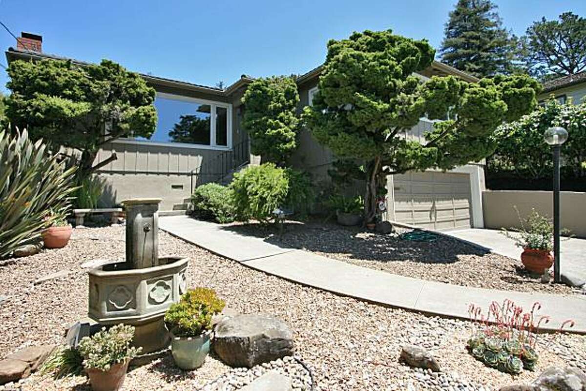 Berkeley hills home has landscaping front, rear