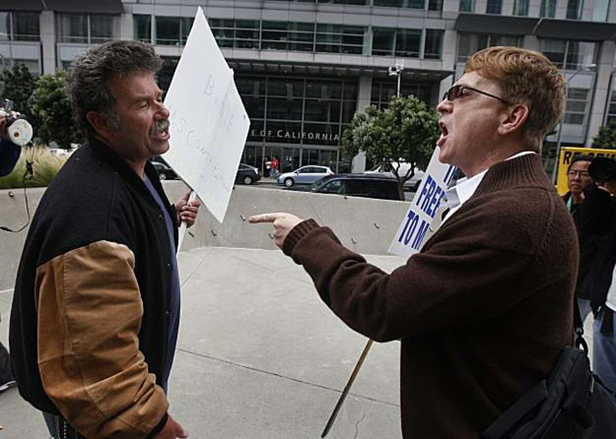 Proposition 8 supporter Mark Wassberg (left) and same-sex supporter Ron Weaver exchange points of view at the Phillip Burton Federal Building before Chief U.S. District Court Judge Vaughn Walker issues his ruling on the constitutionality of Proposition 8 in San Francisco, Calif., on Wednesday, Aug. 4, 2010.