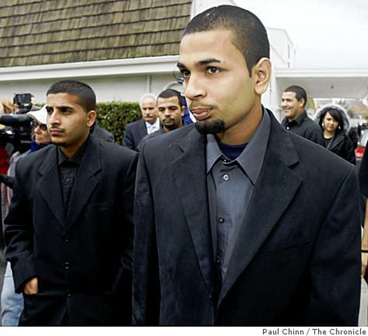 Paul Dhaliwal (right) one of the two brothers injured in the tiger attack, leaves the funeral service for 17-year-old Carlos Sousa, Jr. in San Jose, Calif. on Tuesday, Jan. 8, 2008. Sousa was killed in the Christmas Day tiger attack at the San Francisco Zoo