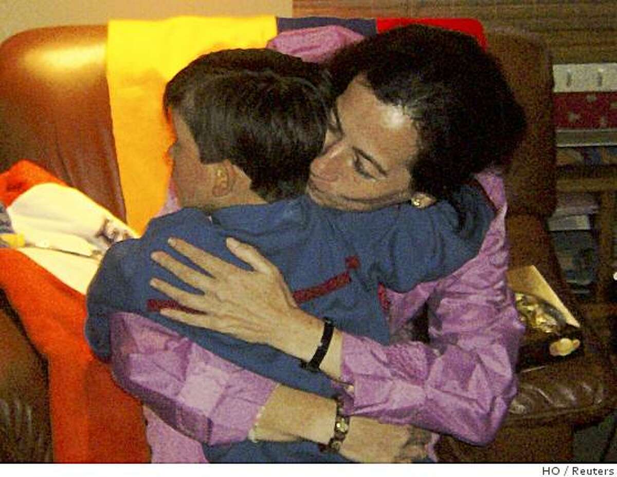Colombian politician Clara Rojas embraces her son Emmanuel at a foster center in Bogota January 13, 2008. The Revolutionary Armed Forces of Colombia, or FARC, rebels on January 10 freed Colombian politicians Rojas and Consuelo Gonzalez who were held for years in secret jungle camps. Emmanuel, born in captivity, is under Colombian child welfare office custody. BEST QUALITY AVAILABLE REUTERS/ICBF/Handout (COLOMBIA). EDITORIAL USE ONLY. NOT FOR SALE FOR MARKETING OR ADVERTISING CAMPAIGNS.