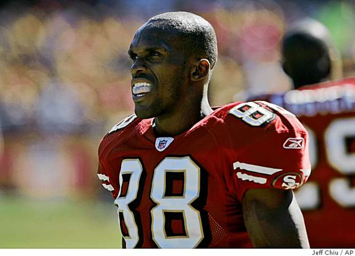 ** FILE ** In this Oct. 12, 2008 photo, San Francisco 49ers' Isaac Bruce watches from the sidelines in the second quarter of an NFL football game against the Philadelphia Eagles in San Francisco. The Rams released Bruce after 14 seasons last winter, will face him this Sunday, as they face off against the San Francisco 49ers. (AP Photo/Jeff Chiu)