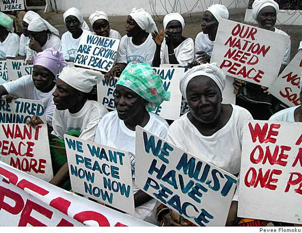 Liberian women demonstrate at the American Embassy in Monrovia at the height of the civil war in July 2003. From the movie "Pray the Devil Back to Hell."