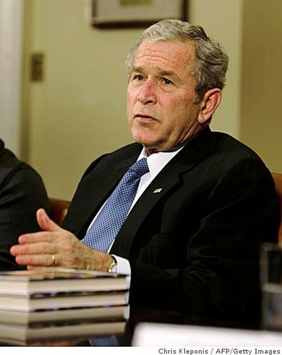 US President George W. Bush speaks at the conclusion of a meeting with people in recovery, leaders in drug prevention, treatment and law enforcement at The White House on December 11, 2008 in Washington, DC. During the meeting, they spoke of some success in the decline in the use of drugs in the nation and efforts to continue efforts to reduce drug use by youths. AFP PHOTO/ Chris Kleponis (Photo credit should read CHRIS KLEPONIS/AFP/Getty Images)