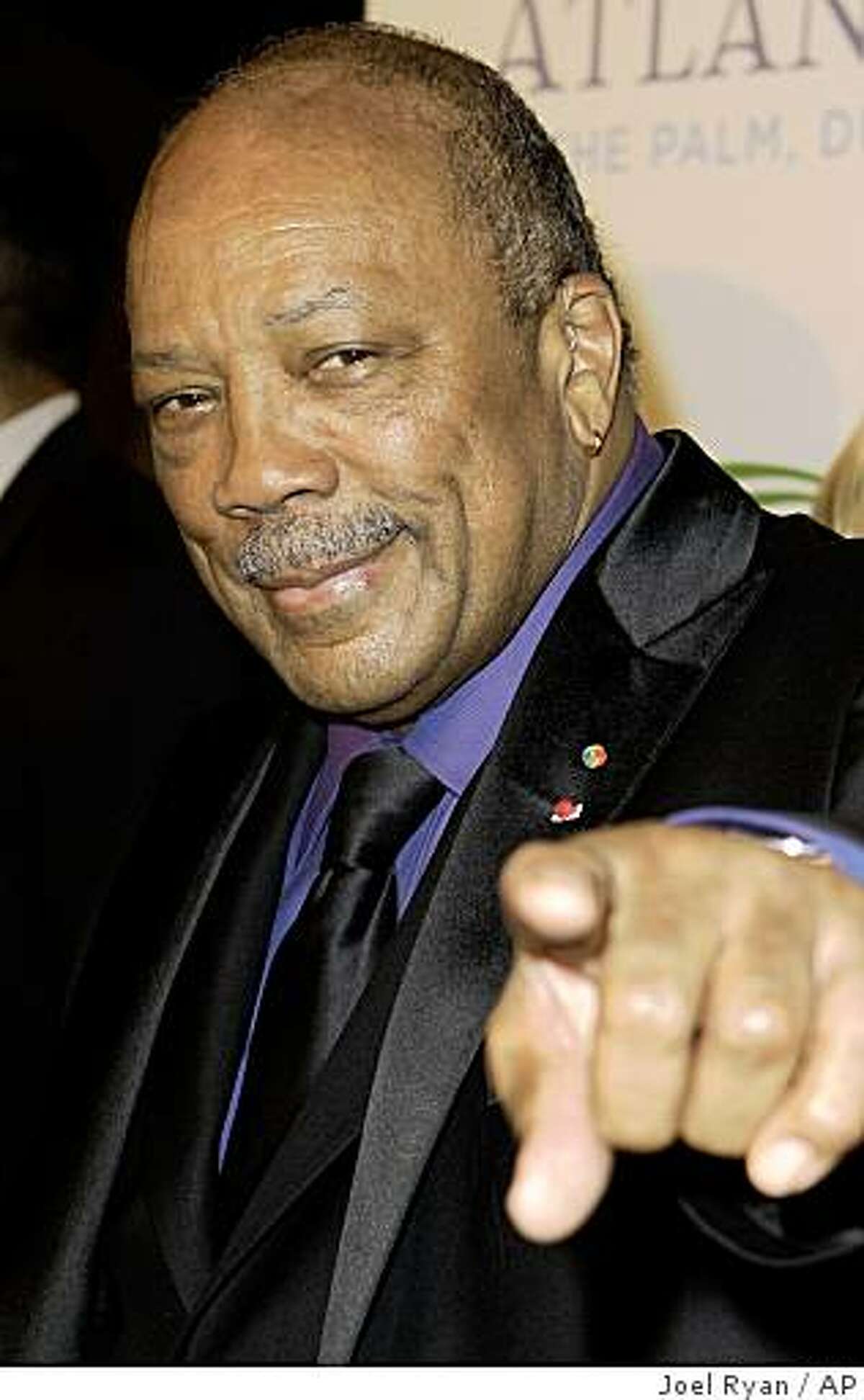 US music maker Quincy Jones arrives on the red carpet of the Atlantis, The Palm Hotel in Dubai launch party, which is the Middle East's biggest opening gala, Thursday, Nov. 20, 2008.
