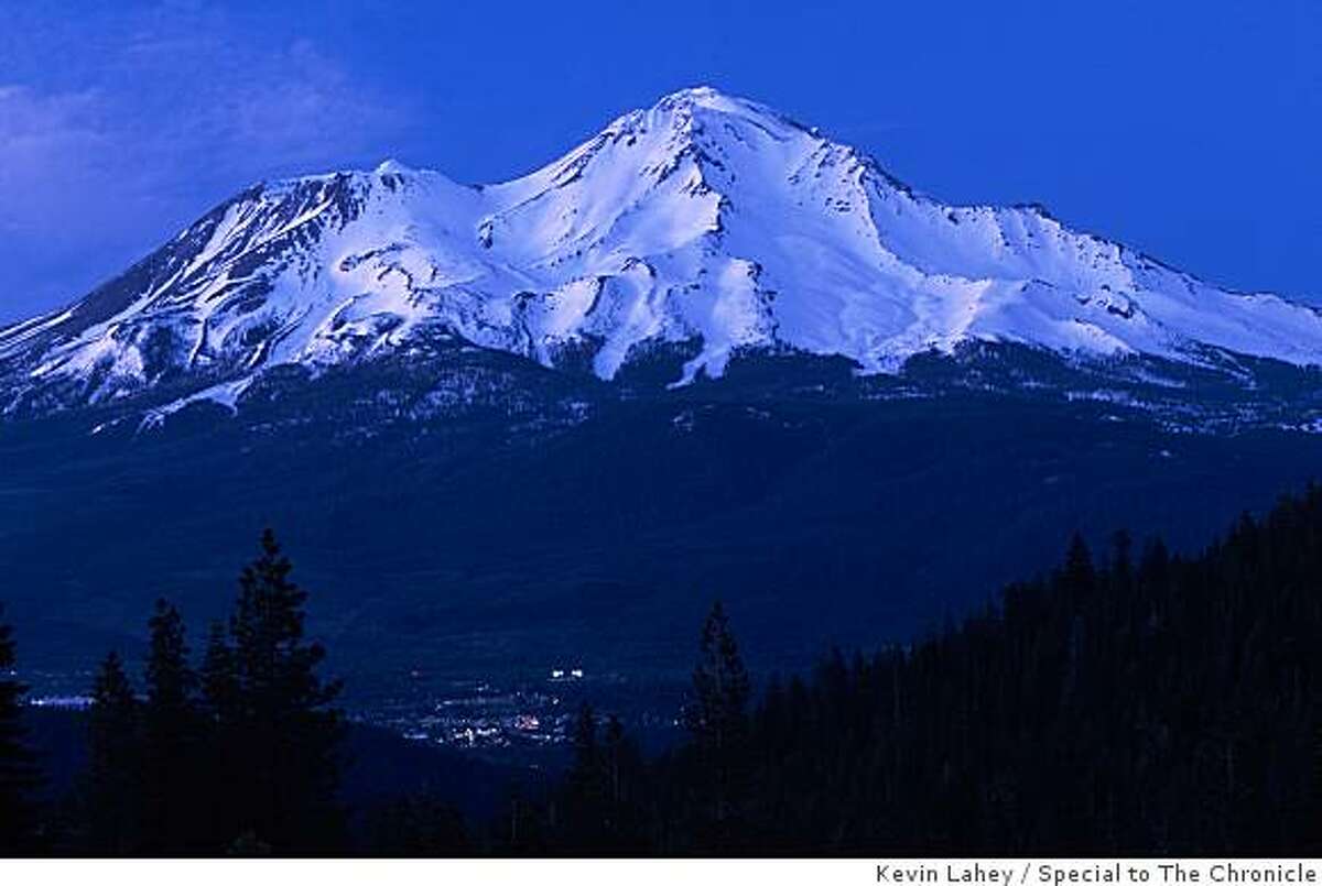Mount Shasta City crouches at the foot of the 14,179-foot peak.