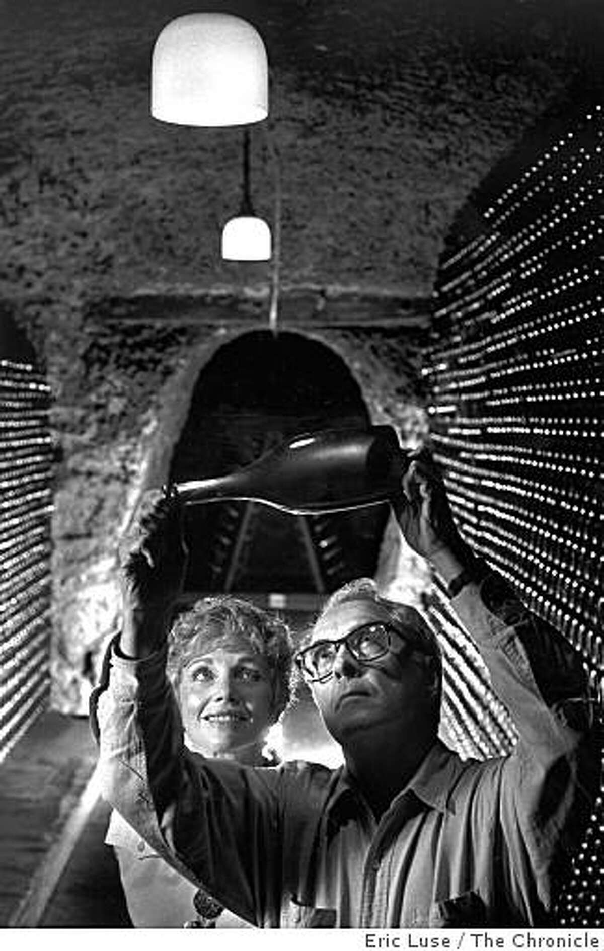 Jack and Jamie Davies, owners of Schramsberg Vineyards and Cellars, in this archive photo dated September 12, 1990. The couple are holding a 1987 bottle of sparkling wine that they were going to release in Europe in 1992. Eric Luse / The Chronicle
