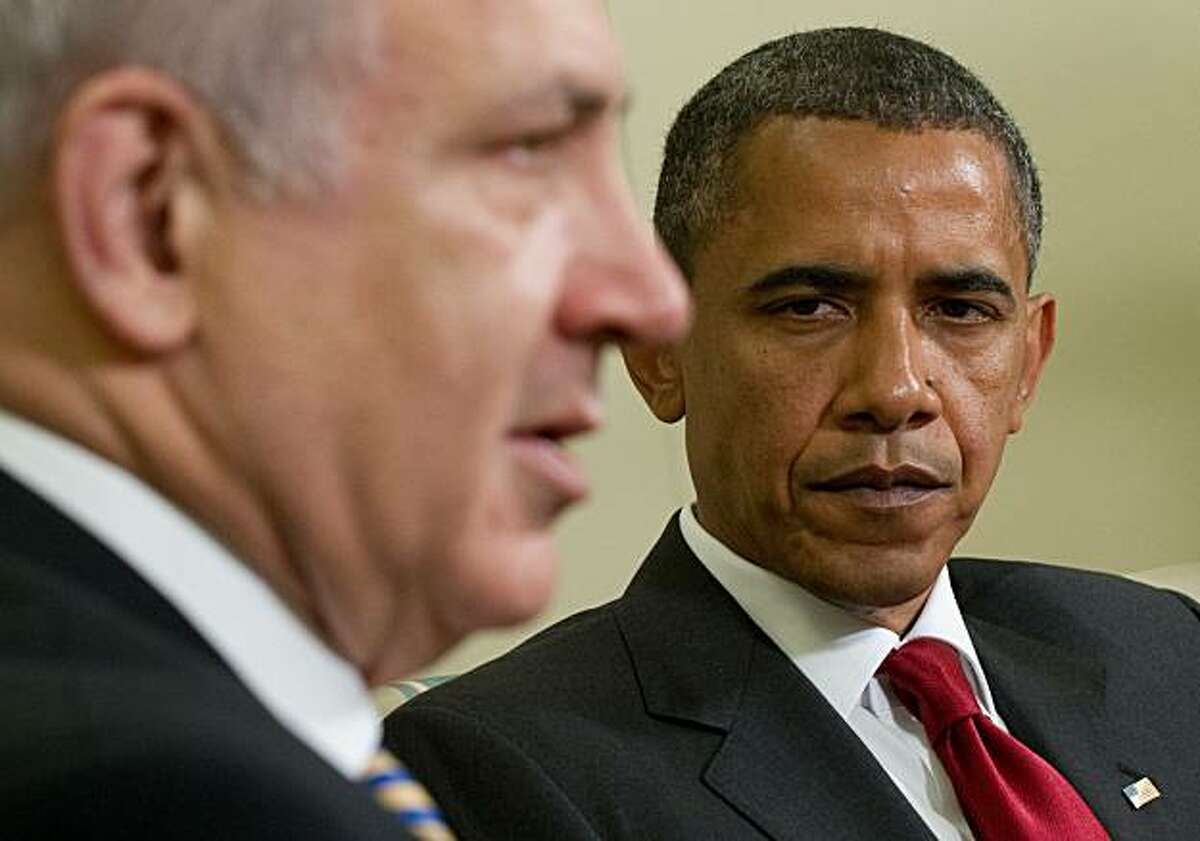 US President Barack Obama listens to Israel's Prime Minister Benjamin Netanyahu during meetings in the Oval Office of the White House in Washington on July 6, 2010.