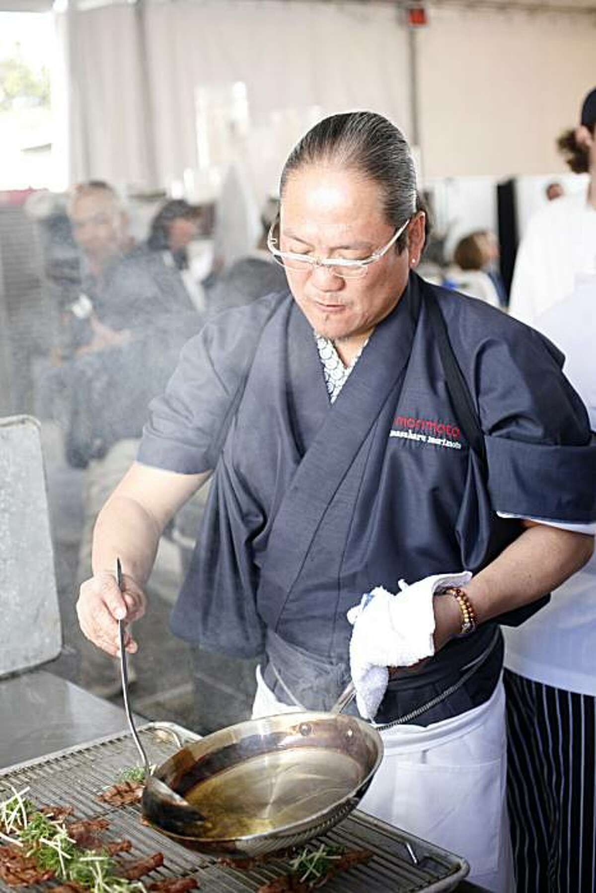 Star of the Iron Chef TV show, Masaharu Morimoto, preparing his dish of Kobe beef with congee for lunch during the first annual Pebble Beach Food and Wine festival at Pebble Beach, Calif., on March 28, 2008. Photo by Craig Lee / The San Francisco Chronicle