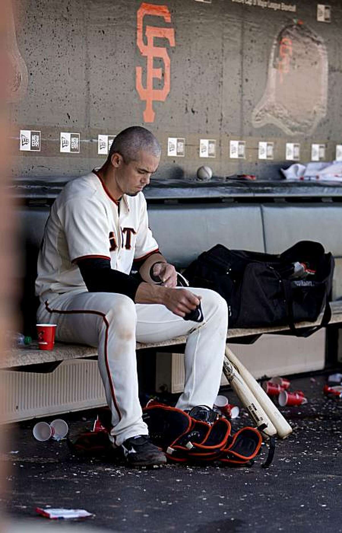 San Francisco Giants catcher Eli Whiteside packs up his gear after a loss to Los Angeles Dodgers in San Francisco on Wednesday.