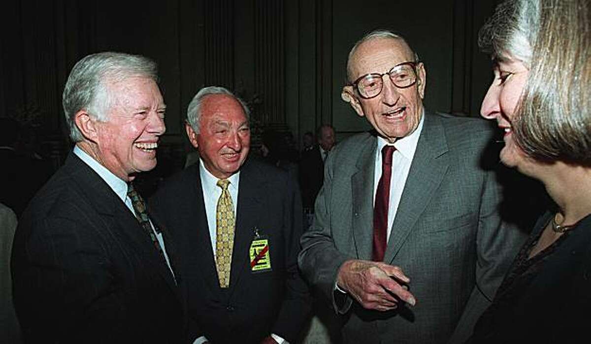 Jimmy Carter, Walter Shorenstein, David Packard and Packard's daughter Susan Orr talk at the U.N. Charter 50th anniversary celebration on April 25, 1995.
