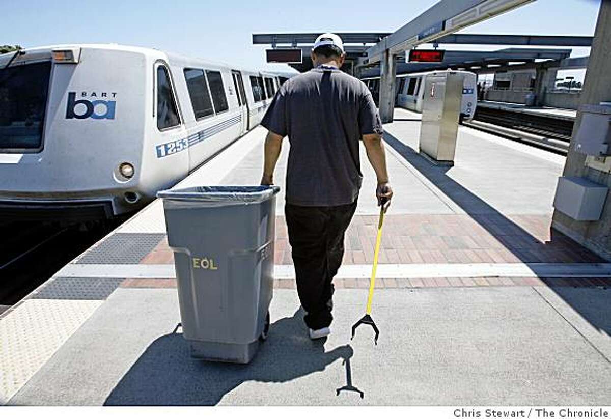 End of line employee Mike Coniglio, 36, awaits the arrival of a BART train before a mad dash to clean it at the Daly City BART station. Photographed June 16, 2007.