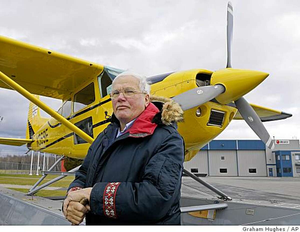 **APN ADVANCE FOR NOV 23** Pilot Bob Bryan stands in front of his airplane at Sherbrooke airport, Que., Monday, Nov., 17, 2008, which he uses to fly along the Quebec and Labrador coast.(AP Photo/Graham Hughes,The Canadian Press)