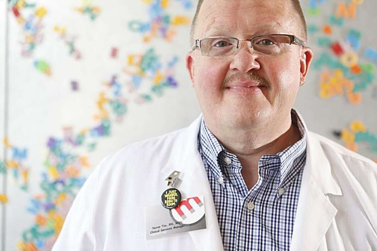 Registered Nurse Tim Ryan, the clinical Services manager at Magnet, a free clinic to test men for AIDS, Stands for a portrait at their offices on Wednesday June 9, 2010 in San Francisco, Calif.