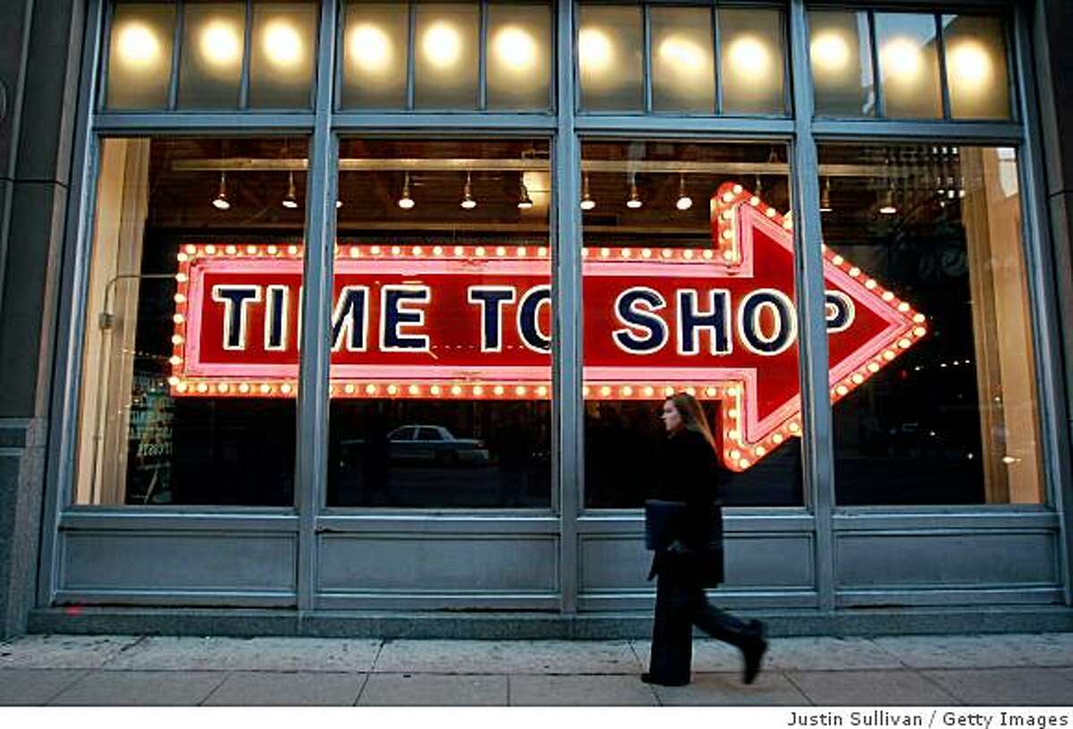 A pedestrian walks by an Old Navy store on November 10, 2008 in Chicago, Illinois. Retailers are starting to decorate their stores with Christmas decorations as they try to extend the holiday shopping season in hopes of bringing in more customers in what could be one of the worst retail shopping seasons in decades.