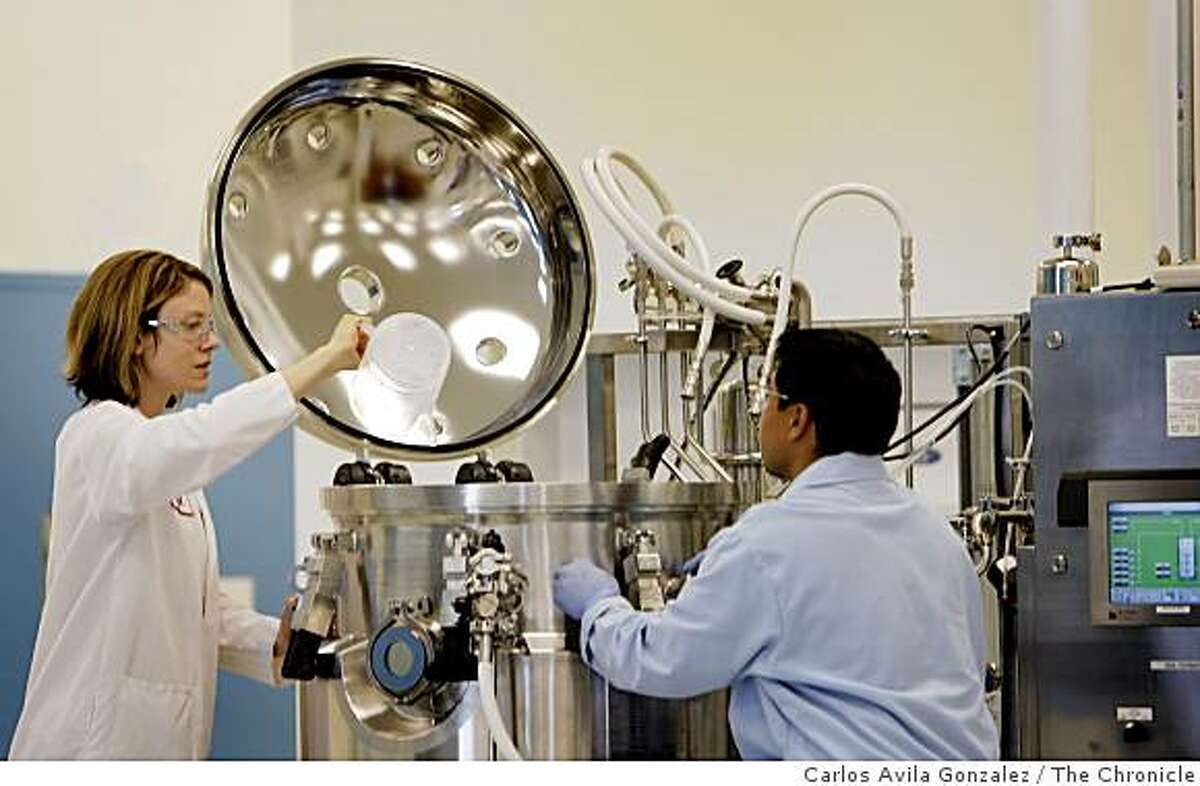 Melissa Harvey, and Jesse Villar, processing plant associates, prepare a tank for bio-deisel conversion at the company's Emeryville, Calif., plant. Start-up company Amyris unveiled its new plant on Tuesday, November 11, 2008. The company is trying to make a renewable form of diesel and has been very tight-lipped about their process. They claim that unlike biodiesel, their product can be used on its own in any regular diesel engine and doesn't need to be blended with petroleum diesel.