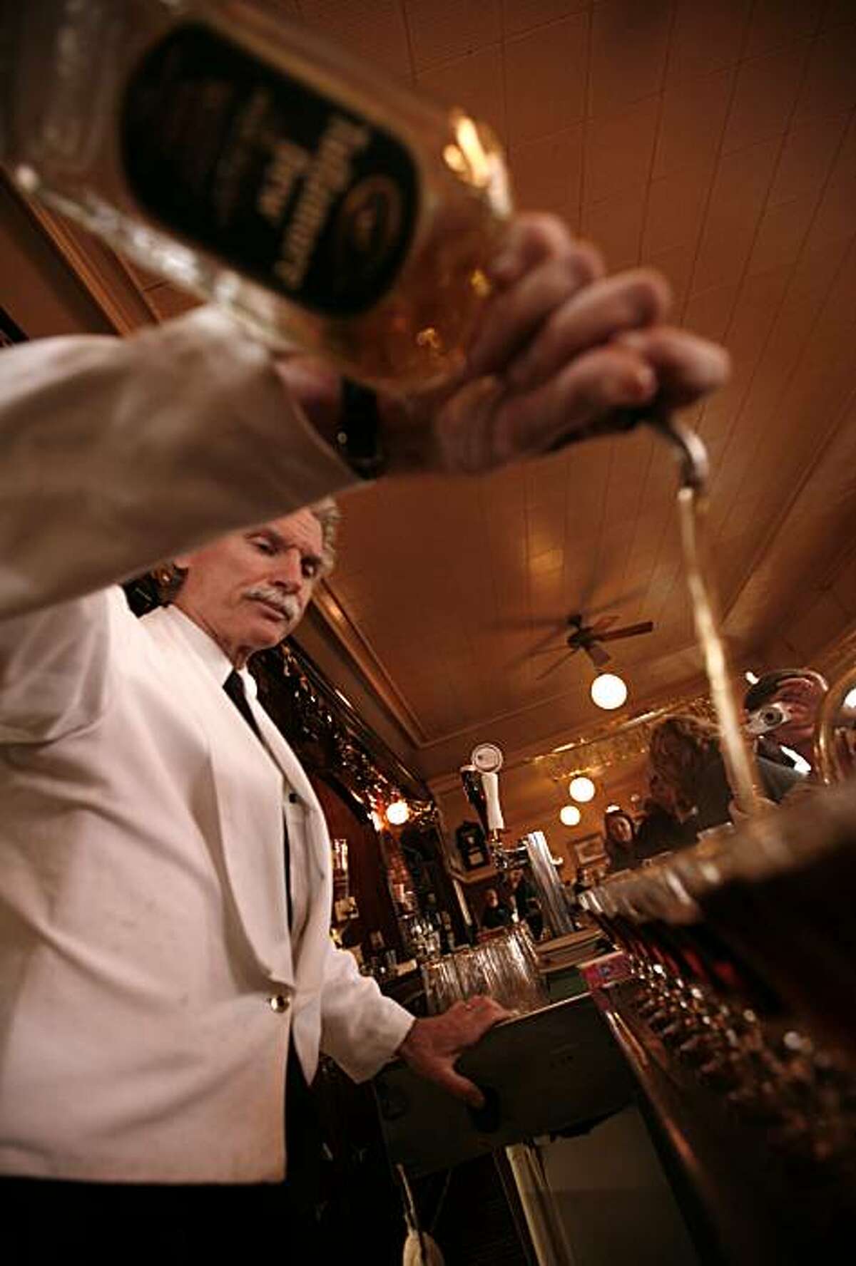 Bartender Larry Nolan says the number of Irish coffees he's poured in his 35 years is in the millions. He sets up ten more as the Buena Vista Cafe kicks off a three-day celebration in honor of the 56th anniversary of the introduction of the Irish coffee on Saturday, Nov. 8, 2008 in San Francisco, Calif.