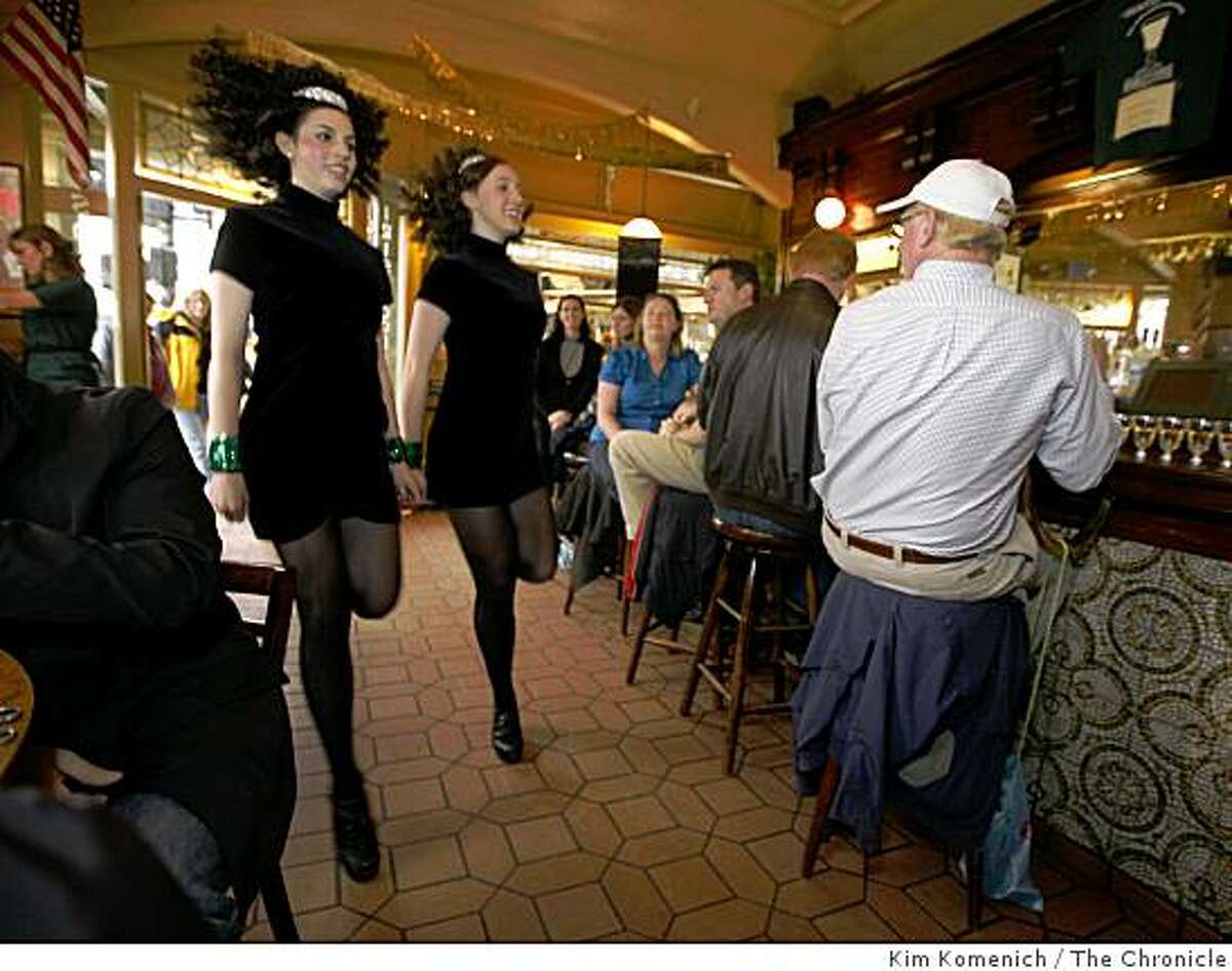 Dancers Chloe Doherty, 17, left, and Kelsey Vickery, 16, both of San Francisco -- a team since they were 6 and 5, respectively-- dance for patrons as the Buena Vista Cafe kicks off a three-day celebration in honor of the 56th anniversary of the introduction of the Irish coffee on Saturday, Nov. 8, 2008 in San Francisco, Calif.