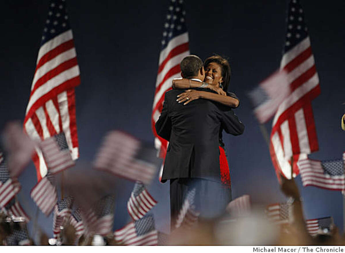 President-elect Sen. Barack Obama gets a hug from his wife Michelle during his election night rally at Grant Park in downtown Chicago, Ill. on Tuesday Nov. 4, 2008.