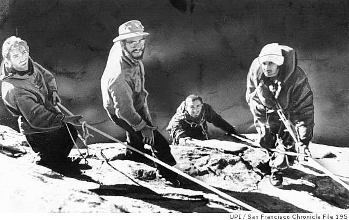 ElCapitan_ph3.jpg November 12, 1958 - Warren Harding, far left, George Whitmore, 27, far right, and Wayne Merry, 27, who is just coming over the edge, complete their ascent of El Capitan in Yosemite National Park. Also pictured is George Whitmer, second from left, who is a member of the support party which greeted the climbers.UPI/ San Francisco Chronicle File 1958