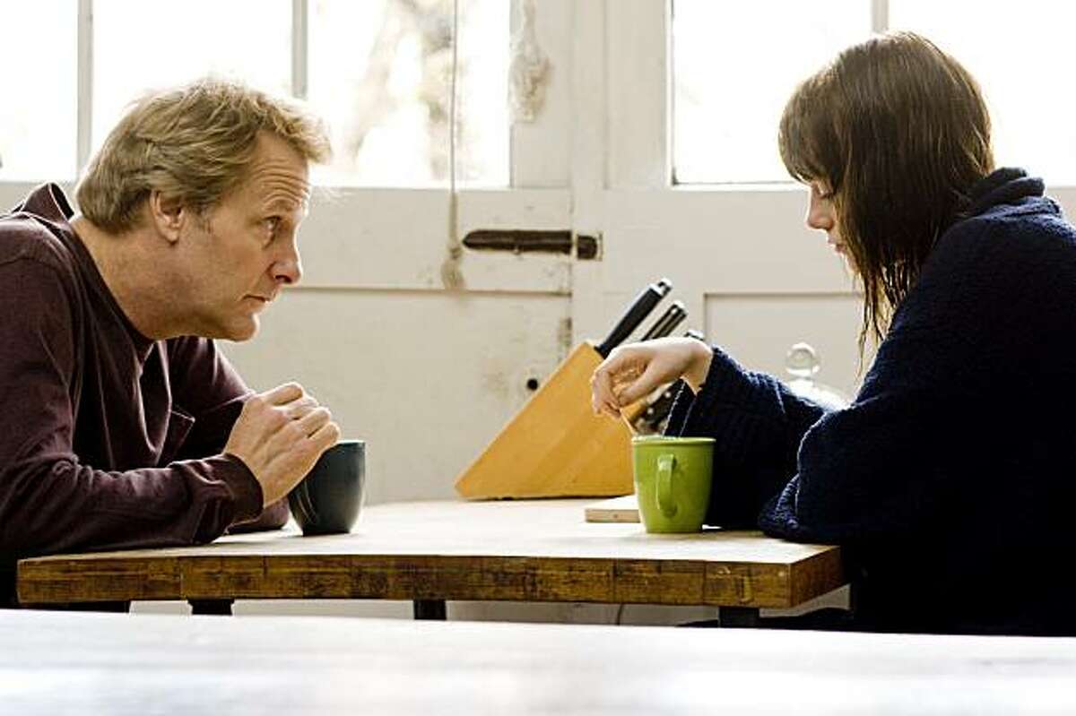 Jeff Daniels and Emma Stone appear in a scene from, "Paper Man."