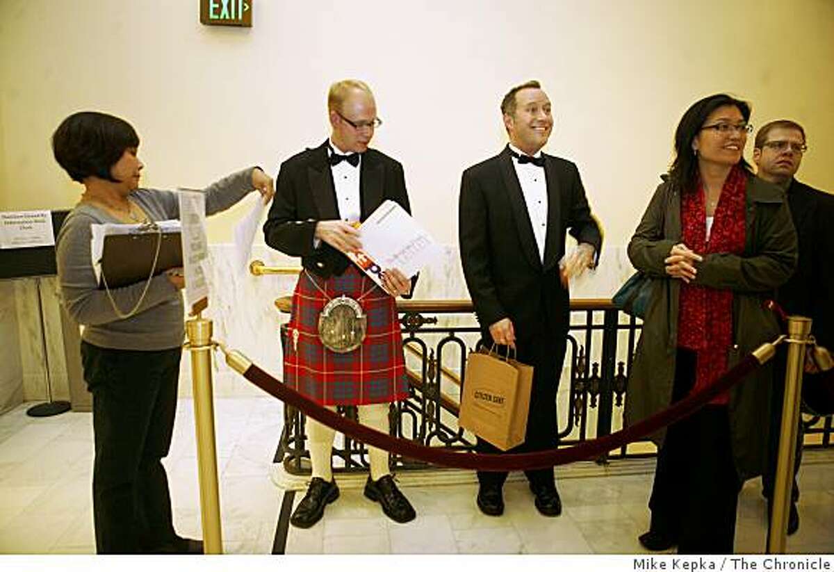 Christopher Myers, 37 and Kyle Minor, 40, wait in line for their appointment to be married at San Francisco City Hall on Thursday Oct. 31, 2008. After city officials extended hours for marriages at City hall just before the election, Minor and Myers, who originally got married in City Hall in 2004, decided to tie knot again in case Prop. 8 passes this coming Tuesday.