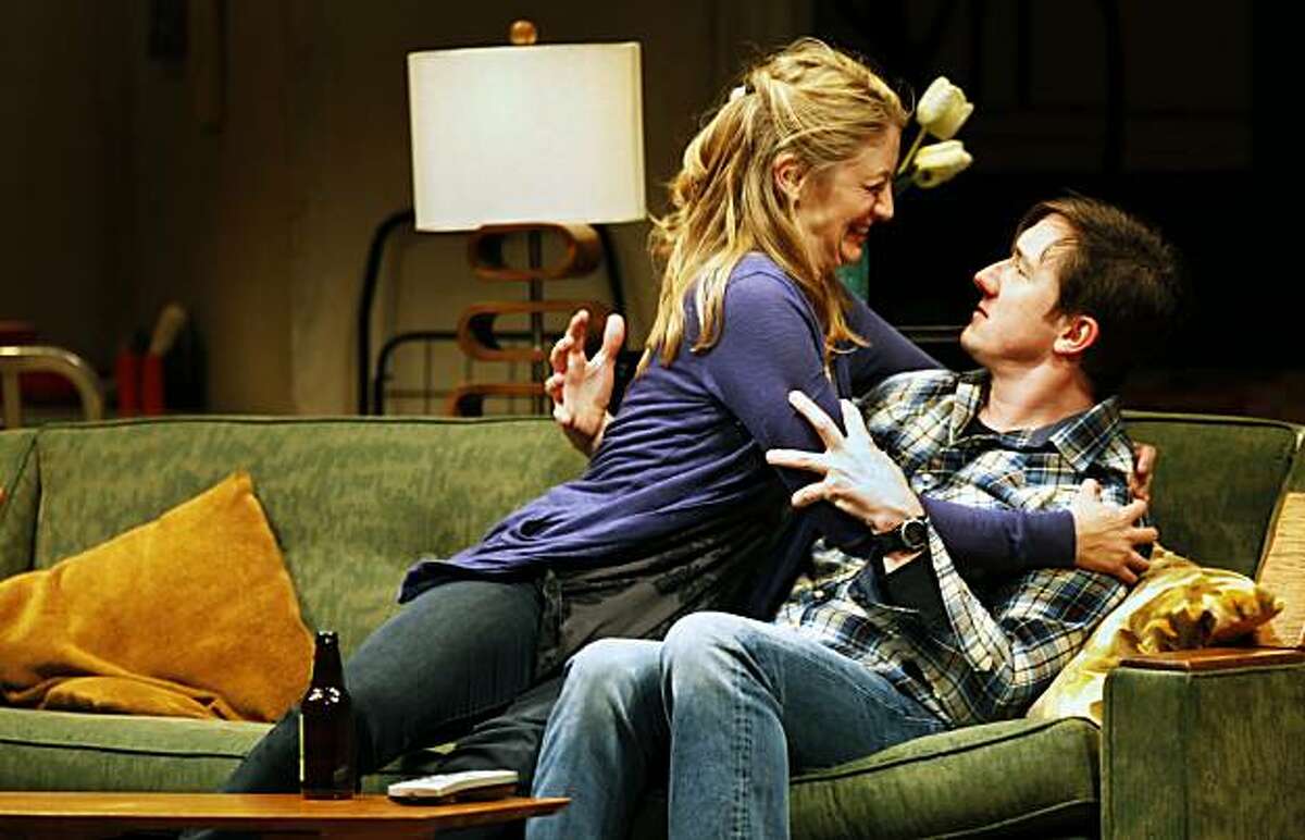 Heidi Schreck, who plays Ellen, hugs Carson Elrod who plays Danny in new production of "In the Wake, " a new show by Lisa Kron and director Leigh Silverman, who created the big Broadway hit "Well." "In the Wake, " is now playing at Berkeley's Repertory Roda Theater. Thursday May 13, 2010.
