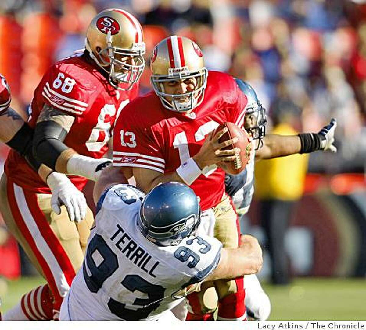 San Francisco 49ers quarterback Shaun Hill is sacked in the fourth quarter by Seattle Seahawks Craig Terrill, at Candlestick Park, Sunday Oct. 26, 2008, in San Francisco, Calif.