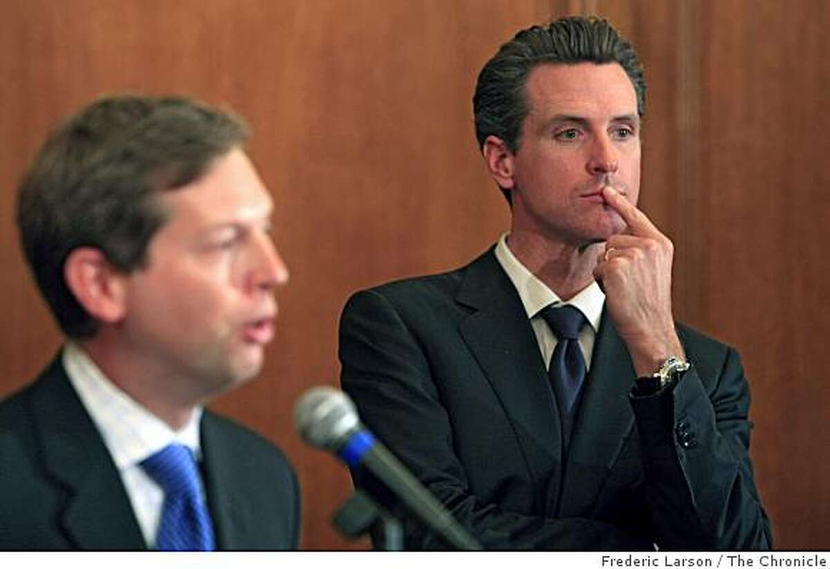 Mayor Gavin Newsom listens to his chief economic advisor, Ted Egan (left) during a press conference at San Francisco City Hall on Monday, October 20, 2008 to talk about the economic conditions facing the city.