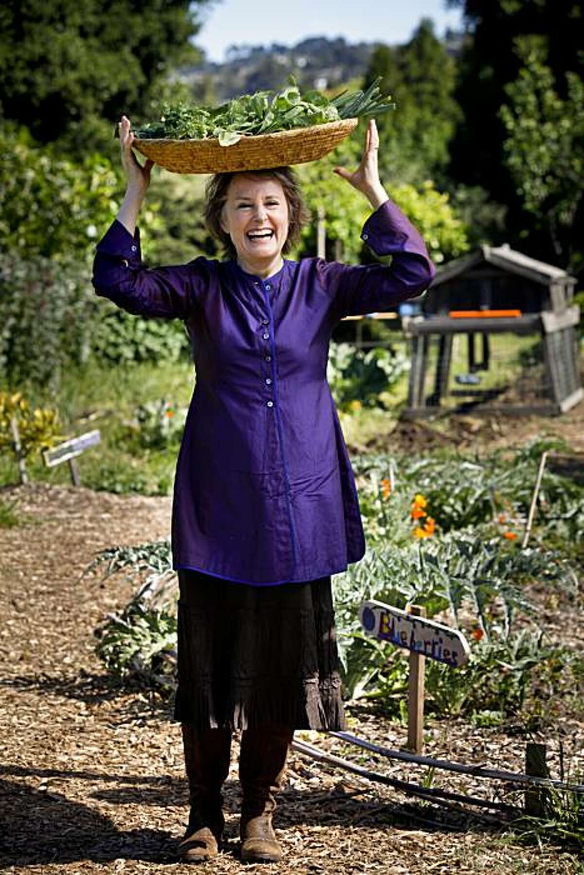Alice Waters stands in the Edible Garden at Martin Luther King Middle School in Berkeley, Calif. on Friday, April 30, 2010.